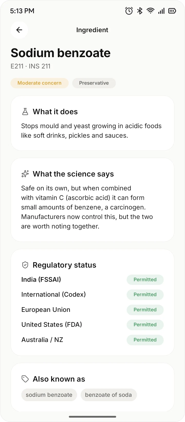 OpenLabel ingredient detail for sodium benzoate, showing per-region regulatory status